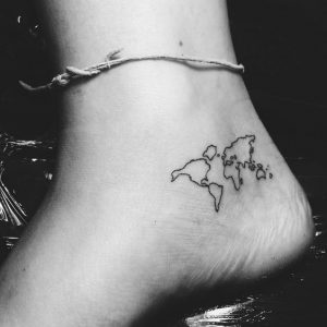 8 gorgeous little tattoos for people who love to travel