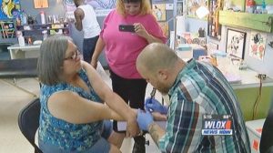 Tattoo artists give ink to help kids in DHS custody