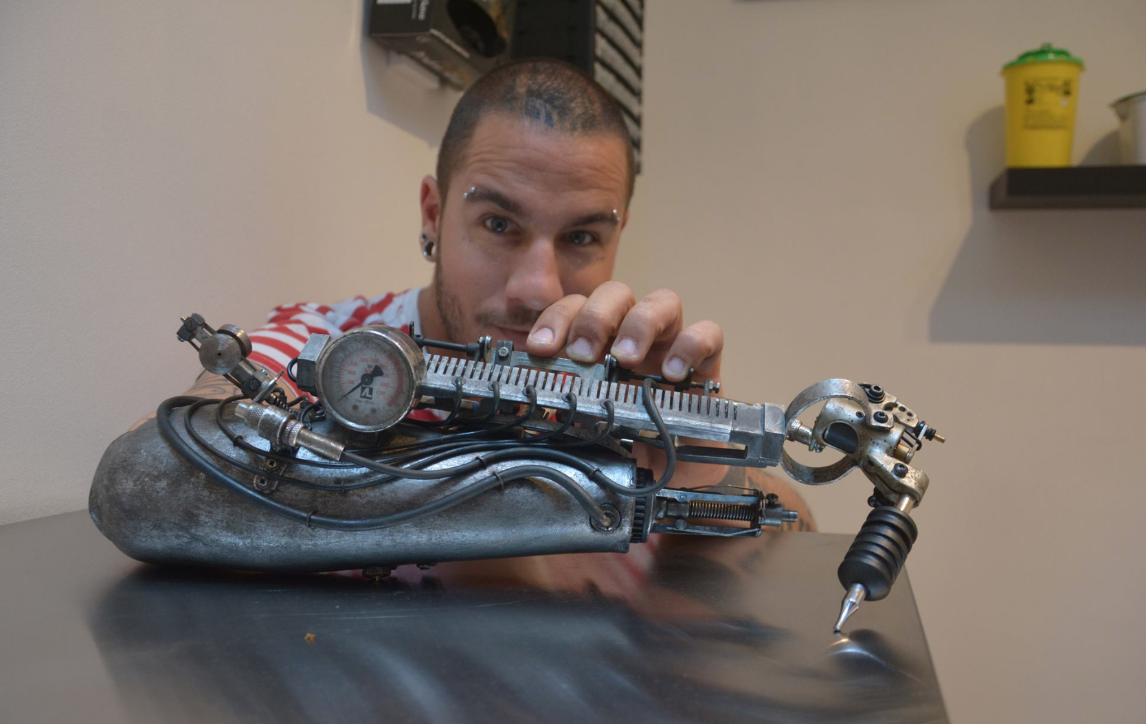 This Badass Prosthetic Arm Doubles as a Tattoo Machine