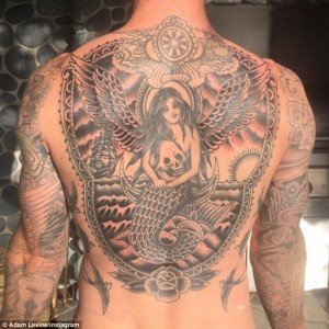 'Blowing my mind with this one!' Adam Levine shares snap showing new details of winged mermaid with skull back tattoo